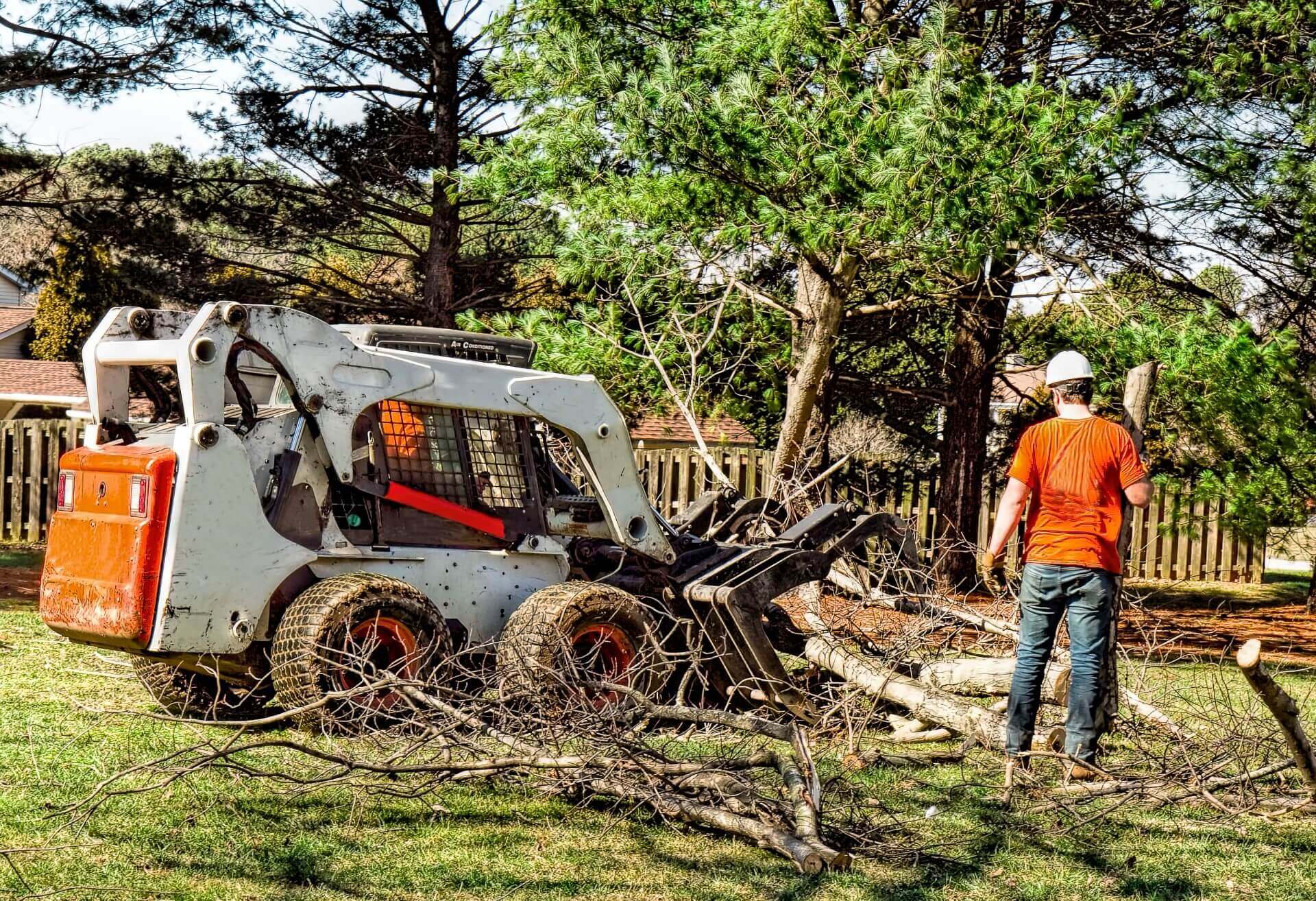 Tree and grounds crew working a commercial property